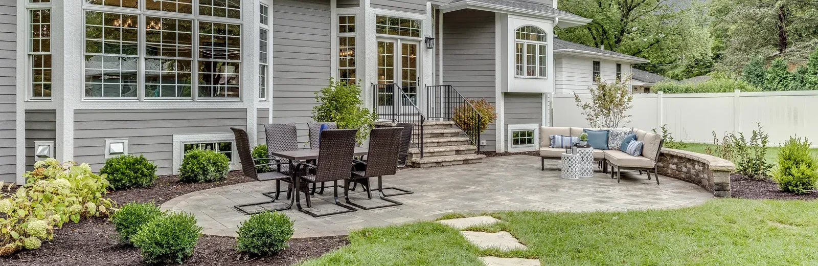 gray house with nice backyard patio